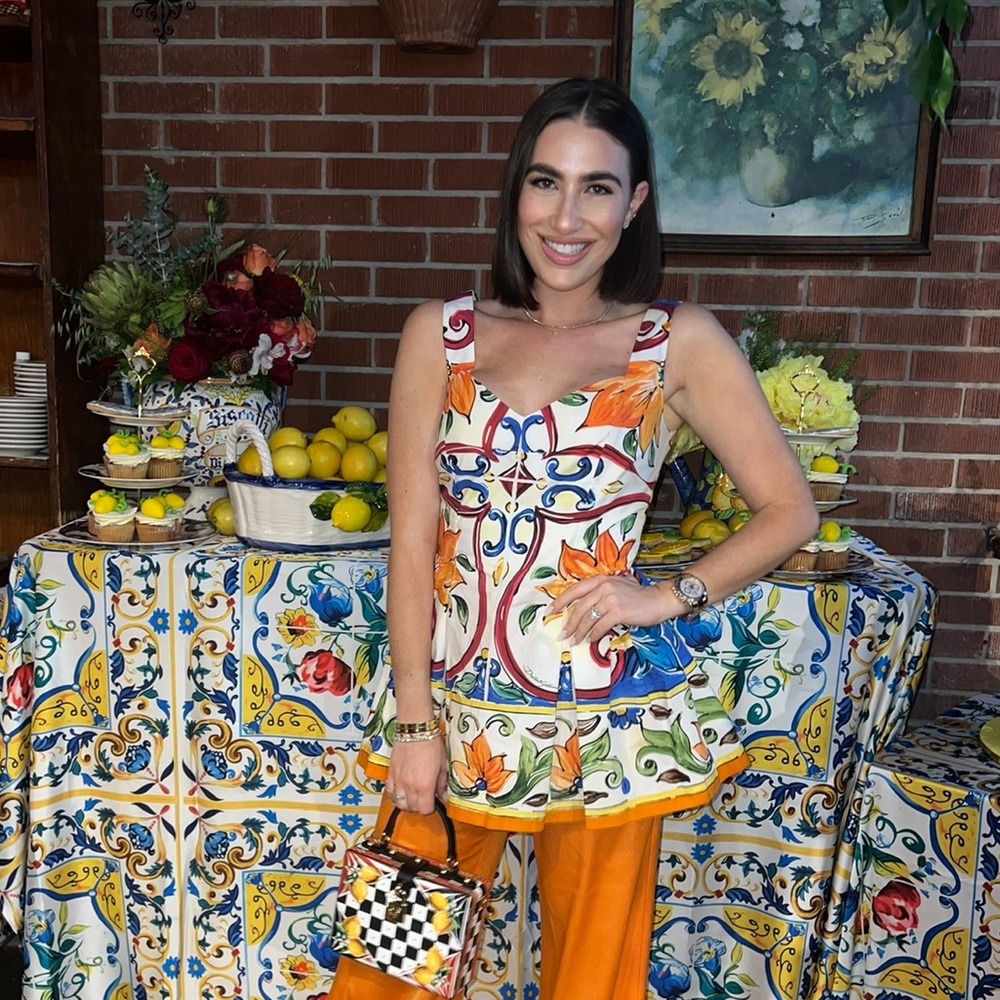 Dolce and gabanna peplum top work once , will fit a size 6